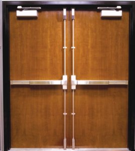 Double door with vertical rod panic devices.