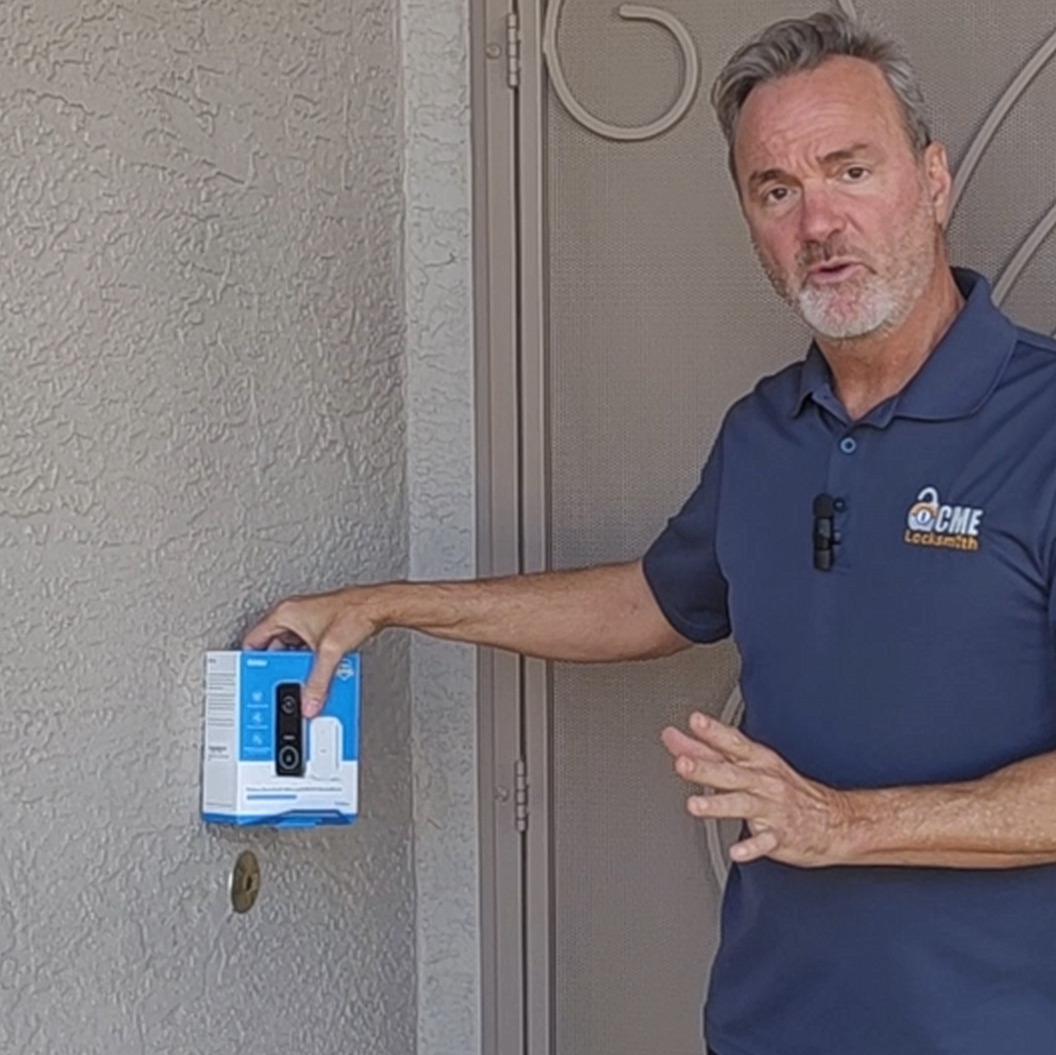 ACME owner with a wireless video doorbell at a Phoenix front door